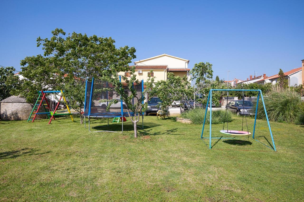 Modern Stone House With Flowers & Playground Медулин Екстер'єр фото