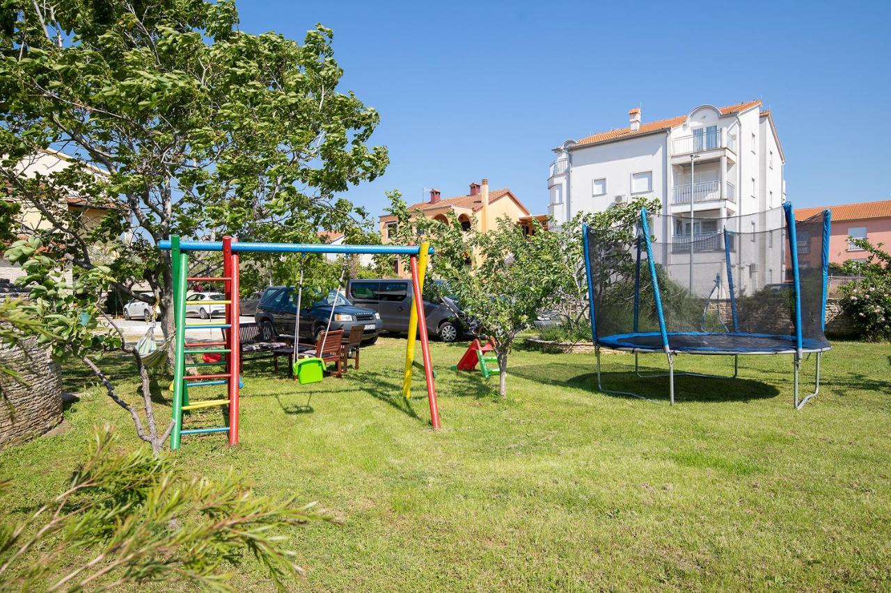 Modern Stone House With Flowers & Playground Медулин Екстер'єр фото